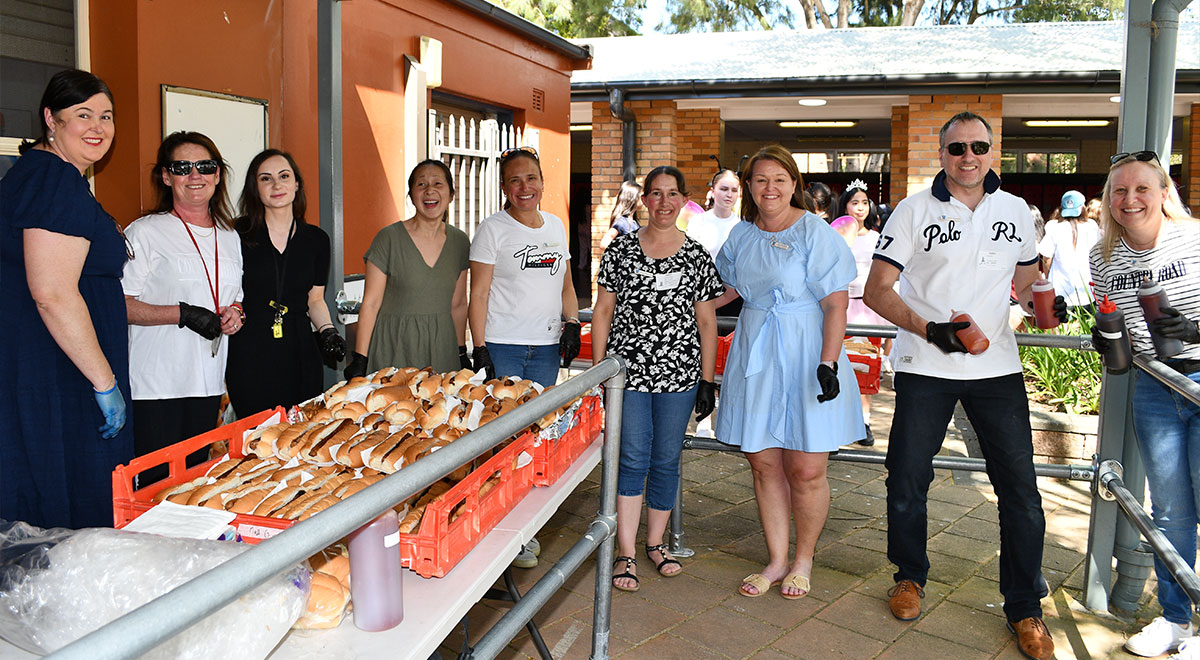 Parents and Carers at Catherine McAuley cooking bbq