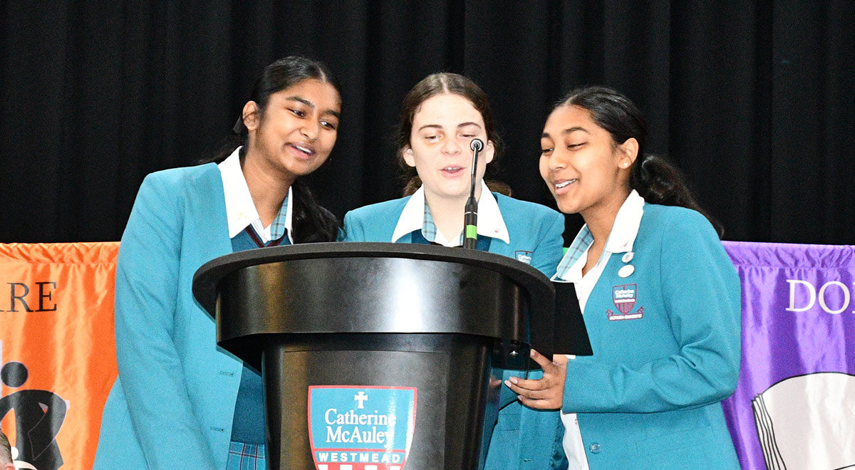 Catherine McAuley house leaders addressing the audience